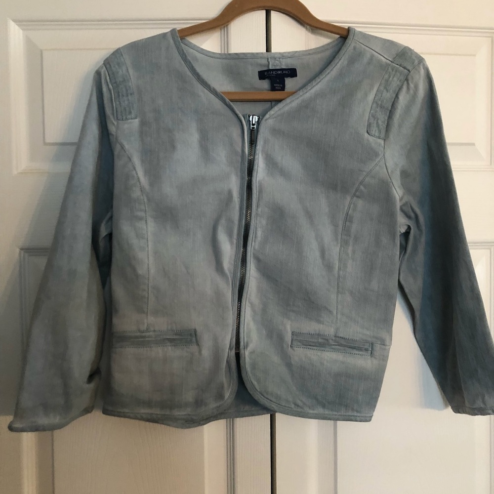 Jean jacket teal in color